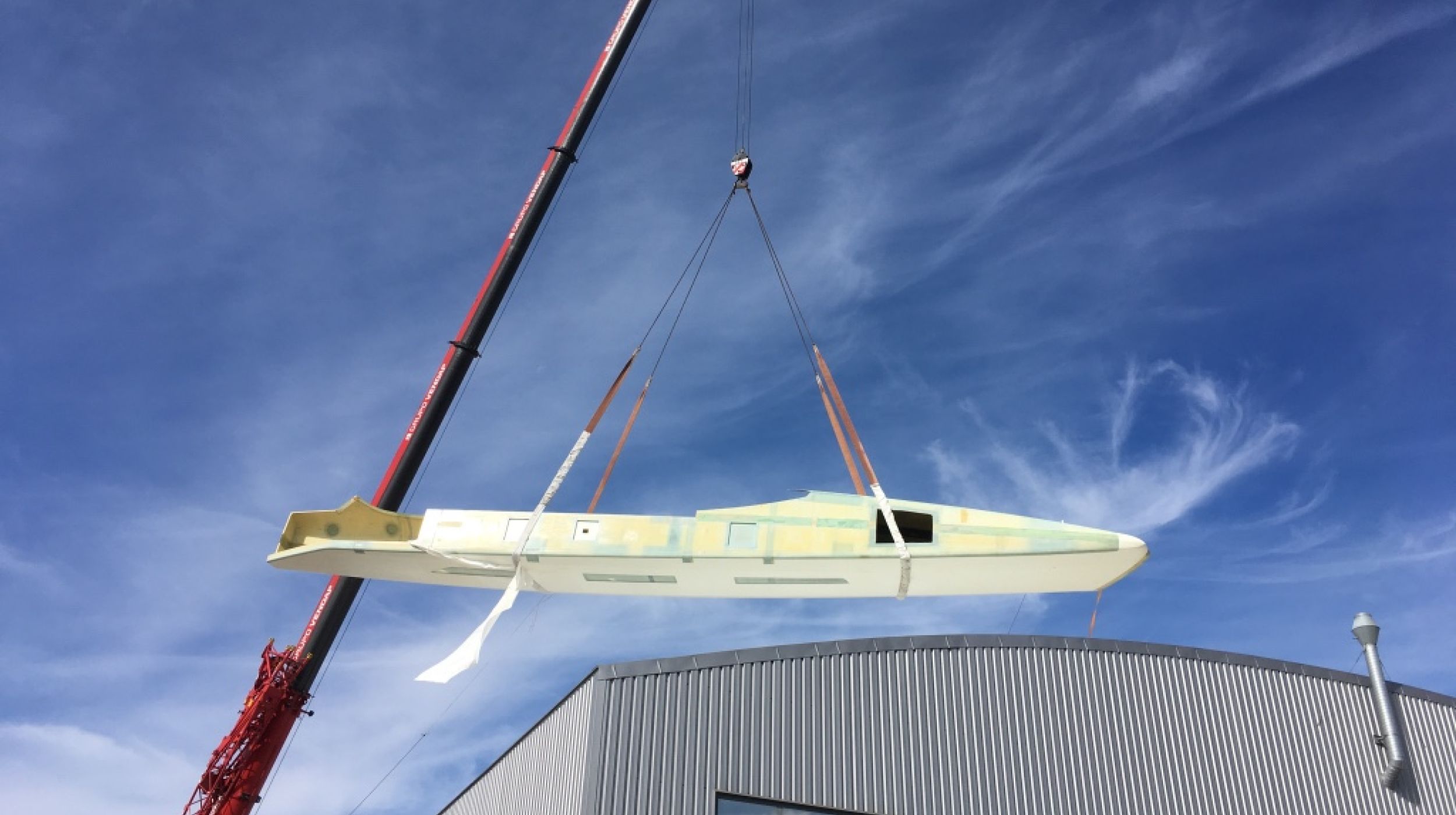 GP70 Hull hoisted with crane